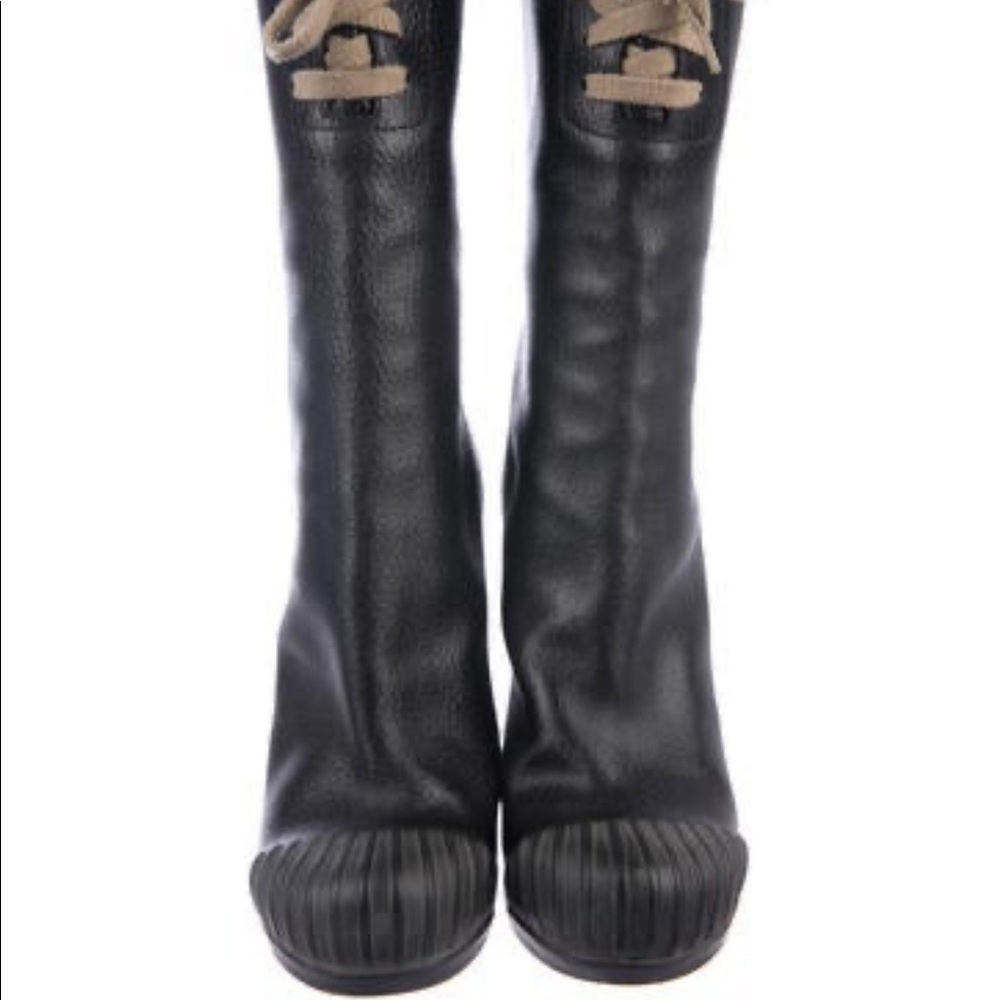 Black leather Fendi round-toed mid calf boot with tonal stitching throughout